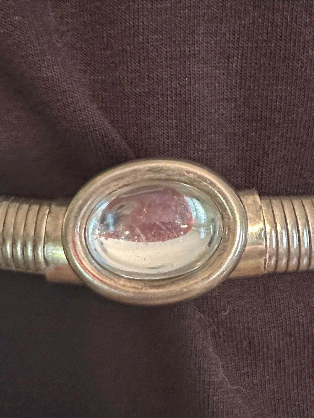 Vintage 80s silver metallic stretch snake belt with an oval cabochon center